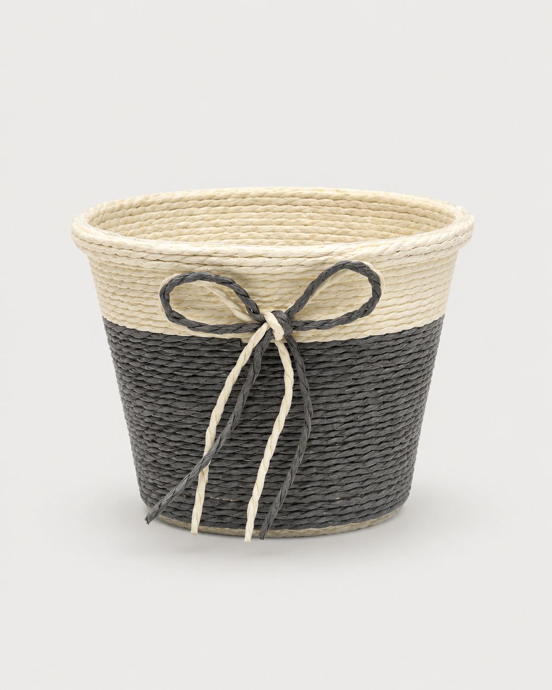 A small grey and natural woven gift basket with a decorative bow, ideal for wellness hampers, chocolates, corporate gifts, and elegant festive gift presentations.