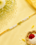 White Pearl Yellow Evil Eye Rakhi