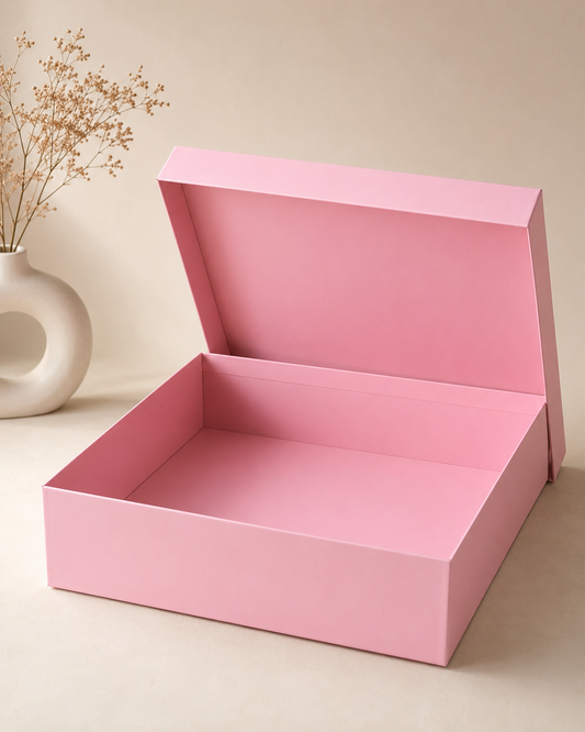 A plain pink square gift box with a hinged lid and spacious interior, suitable for baby shower hampers, bridesmaid gifts, chocolates, beauty products, jewellery, and curated gift sets.