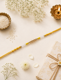 Golden and White Beads Yellow Thread Rakhi for Bhaiya