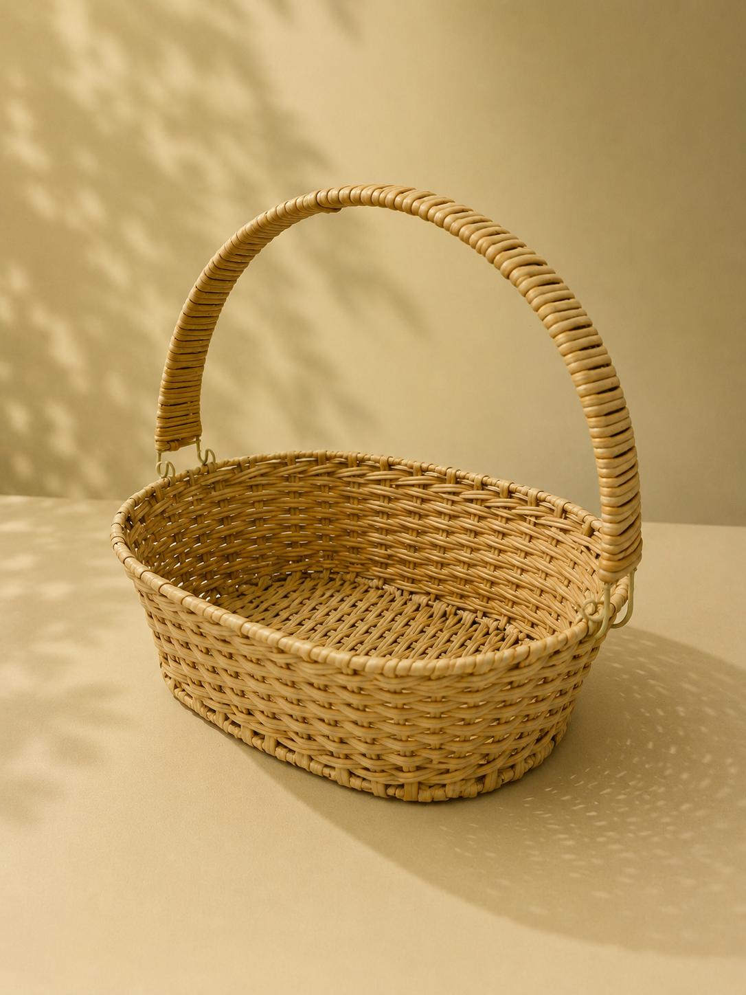 A large natural wicker hamper basket with a rounded handle and open woven design, suitable for wedding hampers, festive gifts, dry fruits, sweets, and flowers.