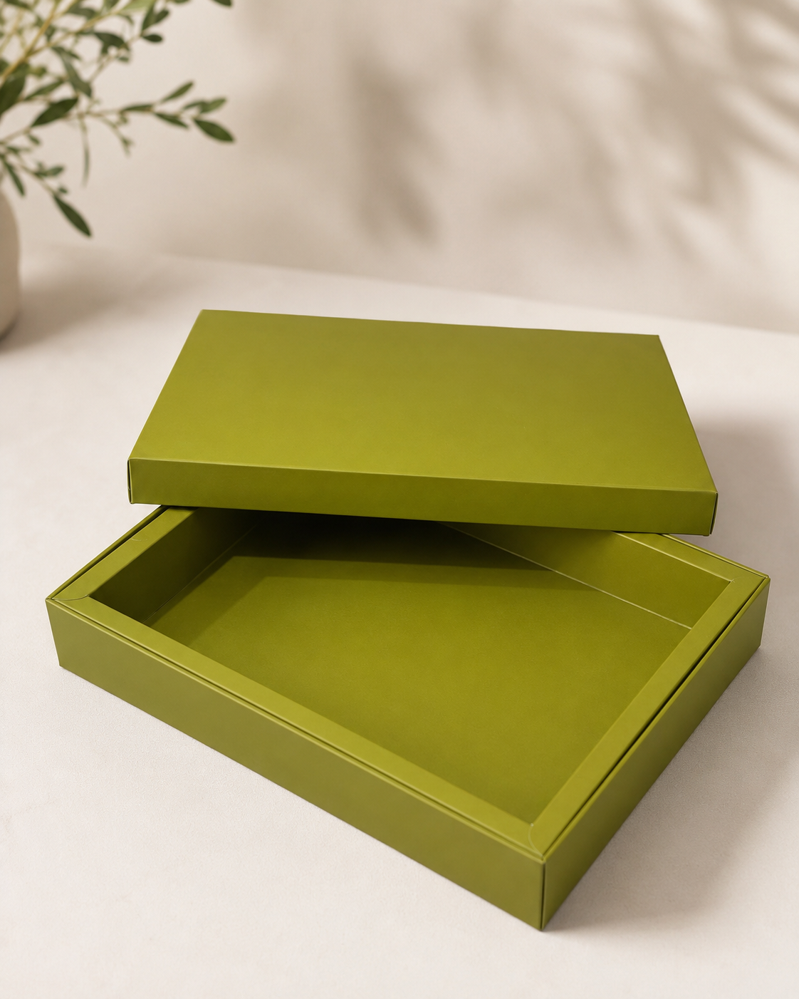 A flat green gift box with a simple rectangular design and fitted lid, suitable for chocolates, sweets, jewellery, candles, keepsakes, and customised gifting.