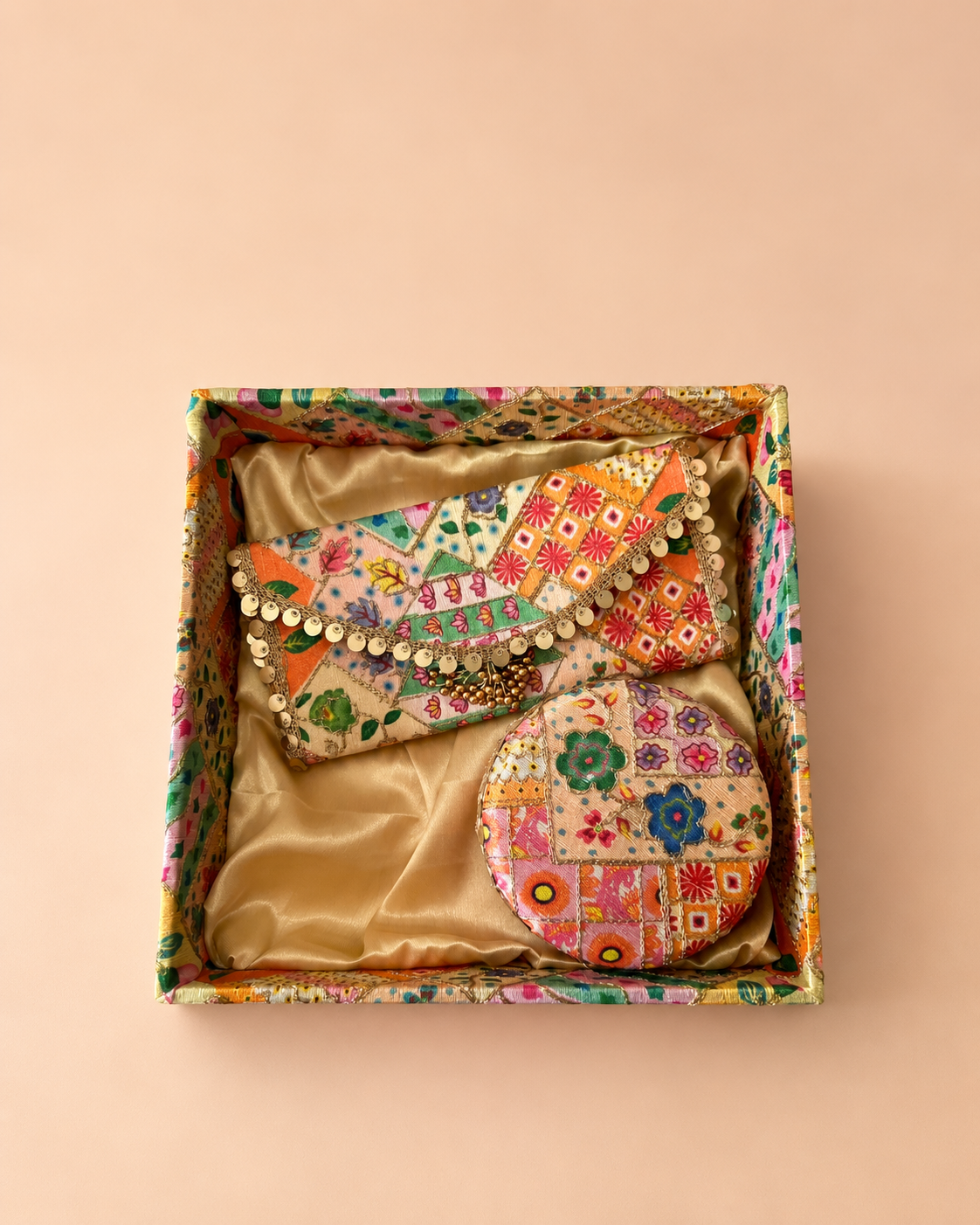A colourful Rangbirangi tray platter hamper with traditional Indian patterns and decorative detailing, suitable for jewellery, shagun items, sweets, bridal accessories, and festive gifting.