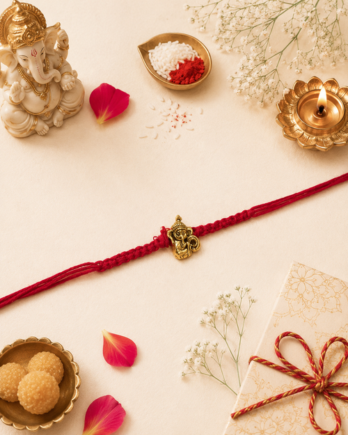 Minimal Ganesh Red Thread Rakhi for Bhaiya