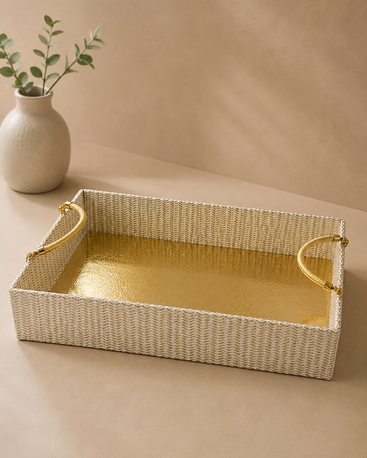 A golden shimmer hamper tray with textured sides, raised edges, and curved handles, suitable for sweets, dry fruits, candles, beauty products, and festive gift arrangements.