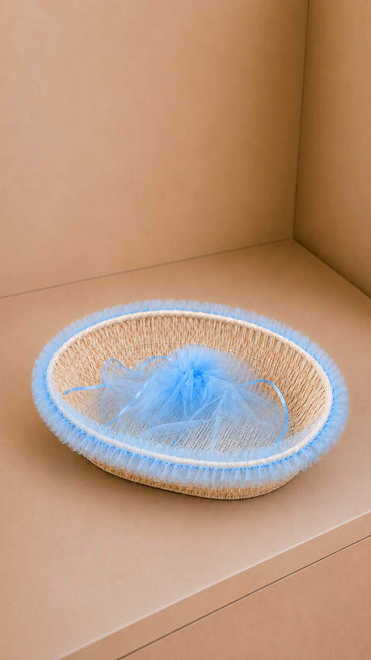 A shallow blue net tokri with an airy woven texture, suitable for arranging chocolates, sweets, flowers, dry fruits, and small festive gifts.