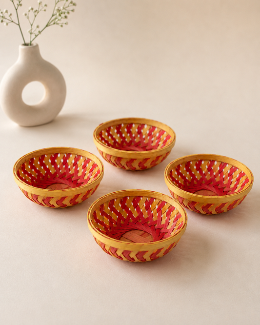 A set of four small handcrafted red woven chaabdis, ideal for presenting sweets, dry fruits, chocolates, and festive gift hampers.