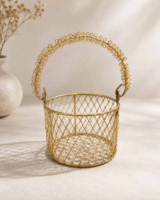 A small golden wire basket with an arched handle and open lattice design, suitable for wedding favours, floral arrangements, festive hampers, and small gifts.