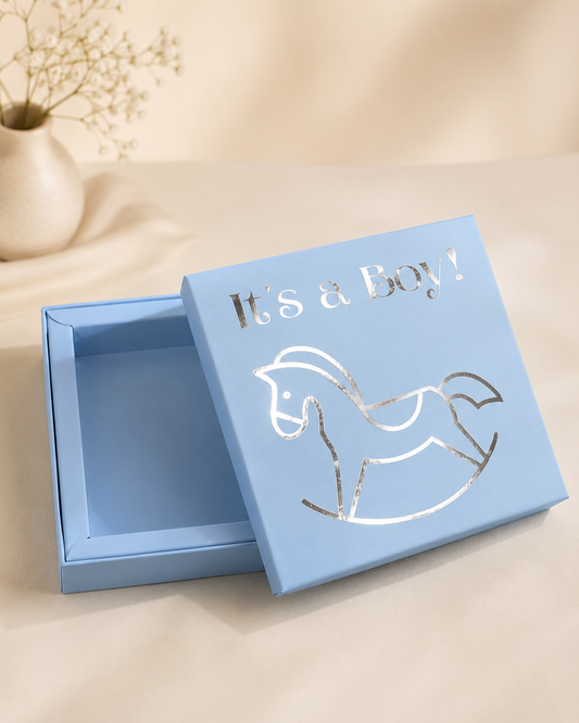 A pastel blue hamper box with a rocking horse design and fitted lid, ideal for baby shower gifts, newborn essentials, keepsakes, and baby boy hampers.